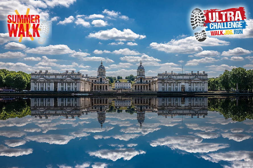 A large building on a clear day with a refelction show on water