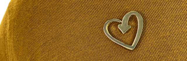 Gold heart badge
