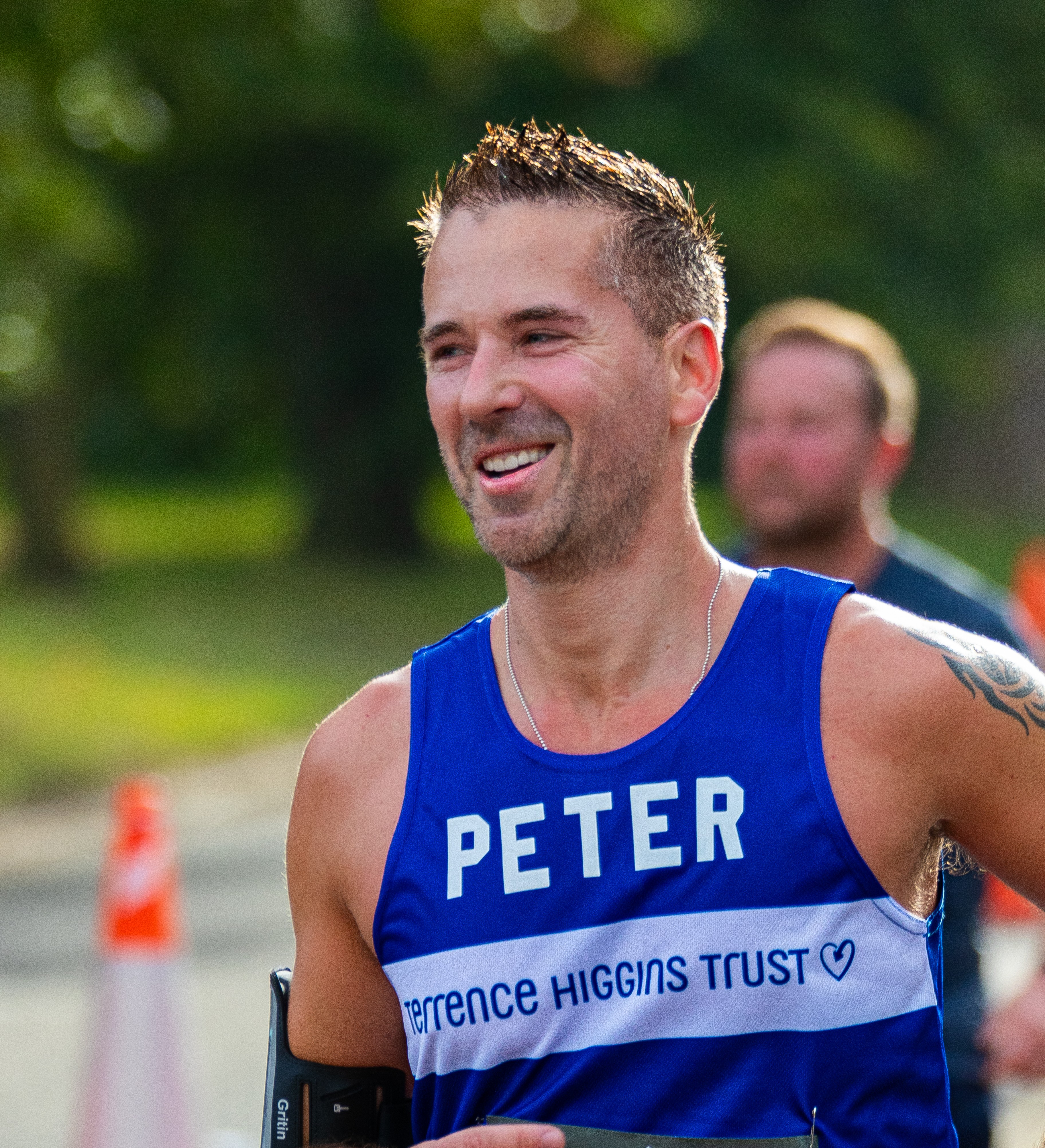 Smiling Terrence Higgins Trust runner