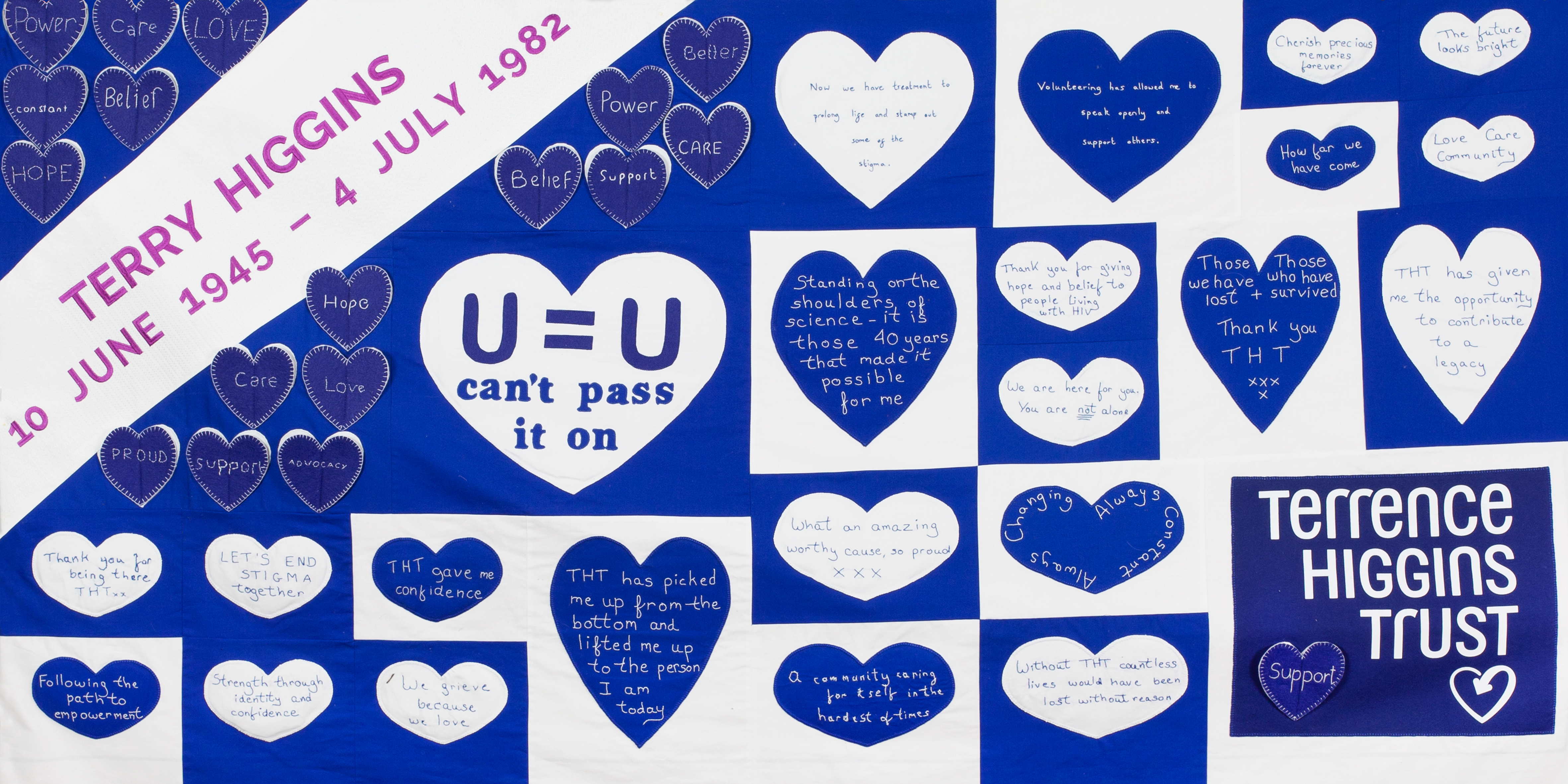 Terry Higgins AIDS Memorial Quilt panel with blue and white hearts and Terrence Higgins Trust logo