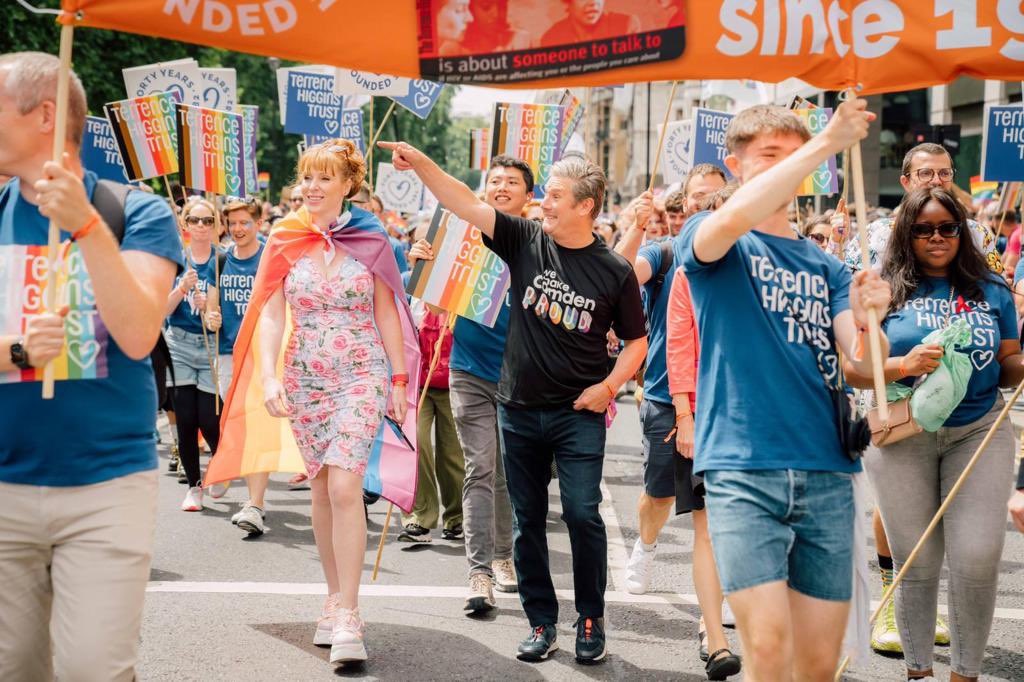 Angela Rayner and Sir Keir Starmer walking with Terrence Higgins Trust at Pride in London. Angela Rayner and Sir Keir Starmer walking with Terrence Higgins Trust at Pride in London.