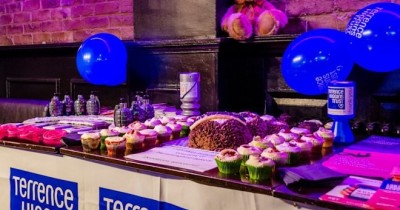Fundraising stall with baked goods and are those grenades?