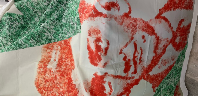 Terry Higgins AIDS Memorial Quilt panel portrait of Terry stamped in red and green