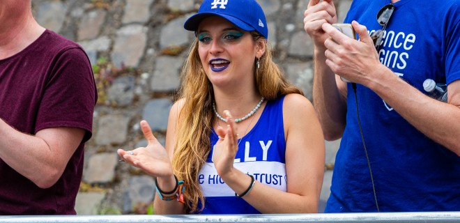 A woman supporting Terrence Higgins Trust at a marathon.