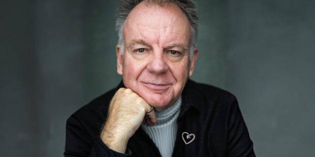 Paul Clayton wearing a heart badge