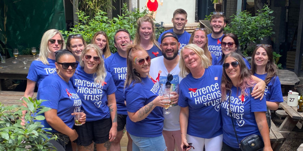 Volunteer Ambassador Frankie with a group of people wearing Terrence Higgins Trust T-shirts