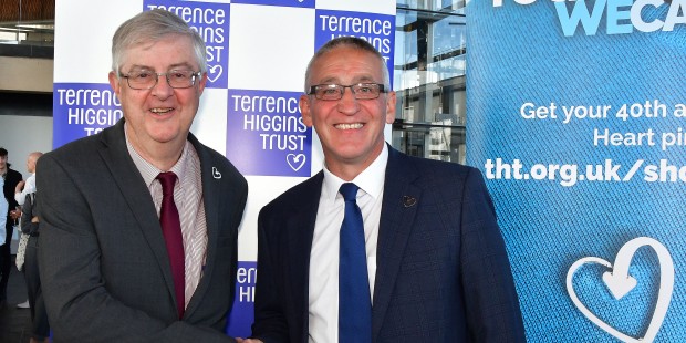 First Minister Mark Drakeford shaking hands with Ian Green