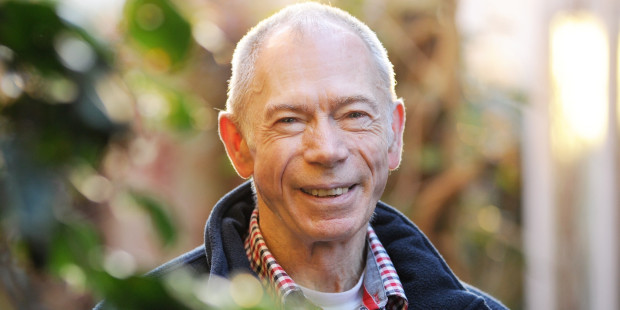 Portrait of Maurice smiling in garden