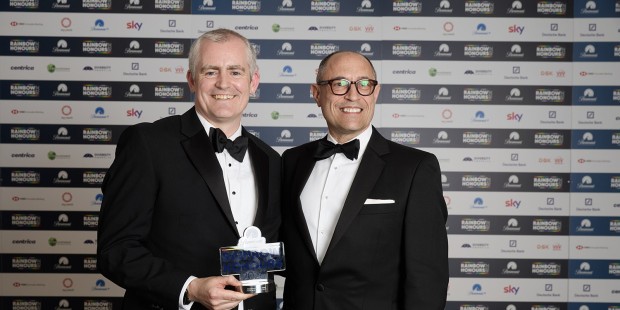Eugene Lynch and Dominic Edwardes stand in receipt of an award at the Rainbow Honours.