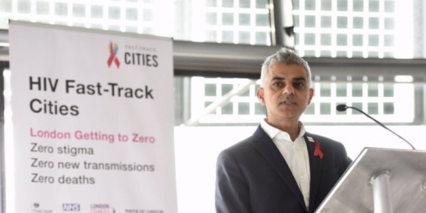 Sadiq Khan speaking in front of HIV Fast-Track Cities banner