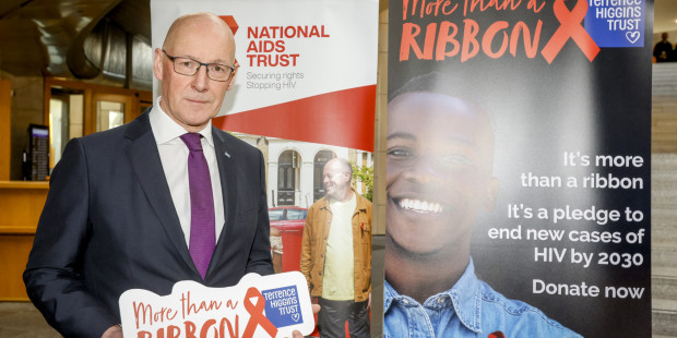 John Swinney MSP commemorating World AIDS Day in the Scottish parliament.