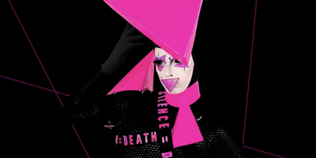 Cheddar Gorgeous in pink triangle outfit from RuPaul's Drag Race