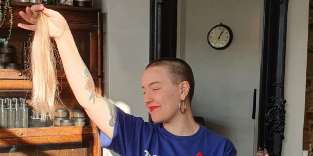 Volunteer fundraising ambassador Rosie and her shaved hair